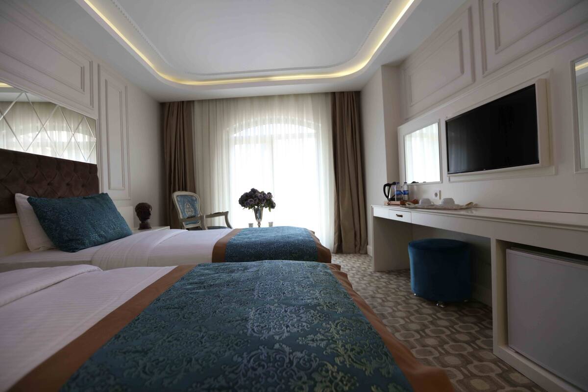 Quarto triplo júnior | Opções para refeição no quarto