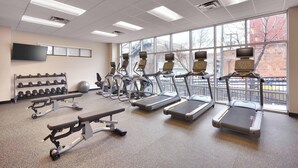 A gym with treadmills, elliptical machines, and weightlifting equipment. - TownePlace Suites by Marriott Salt Lake City Downtown (Salt Lake City)