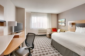 Down comforters, desk, blackout drapes, iron/ironing board