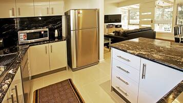 Apartment, 2 Bedrooms | Private kitchen | Full-sized fridge, microwave, oven, stovetop