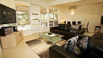 Apartment, 2 Bedrooms | Living area | Flat-screen TV