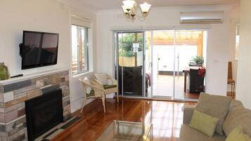 House, 3 Bedrooms | Living area | Flat-screen TV