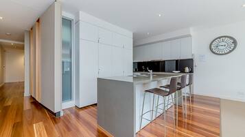 Apartment, 3 Bedrooms (2 Queen & 1 Tri-Bunk) | Private kitchen | Full-size fridge, microwave, oven, stovetop