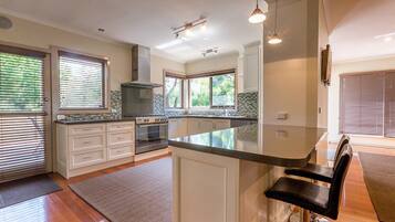 House, 5 Bedrooms (1 King, 2 Queen, 1 Single & 2TriBunk) | Private kitchen | Full-size fridge, microwave, oven, stovetop
