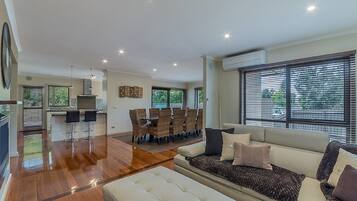 House, 5 Bedrooms (1 King, 2 Queen, 1 Single & 2TriBunk) | Living area | Flat-screen TV, DVD player
