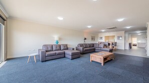 Apartment, 2 Bedrooms | Living area | Flat-screen TV