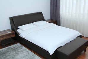 Egyptian cotton sheets, premium bedding, down duvets, memory-foam beds