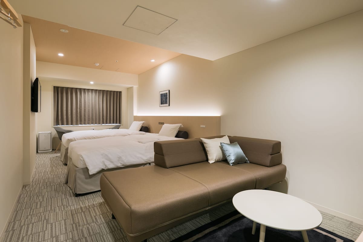 Deluxe Twin kamer, niet-roken | Een kluis op de kamer, gratis wifi, beddengoed, rolstoeltoegankelijk