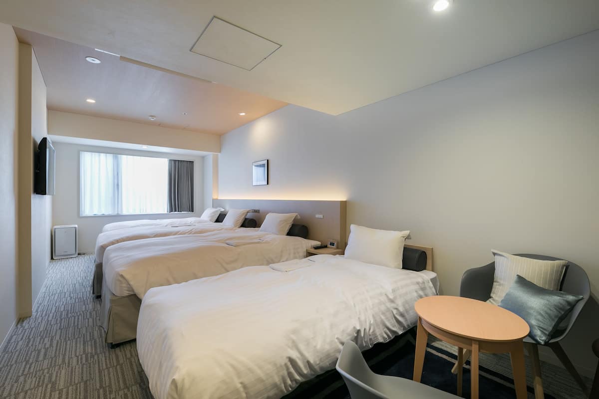 Deluxe Twin kamer, niet-roken (For 4 People) | Een kluis op de kamer, gratis wifi, beddengoed, rolstoeltoegankelijk