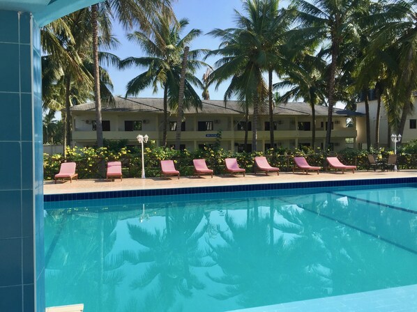 Outdoor pool, pool umbrellas, pool loungers