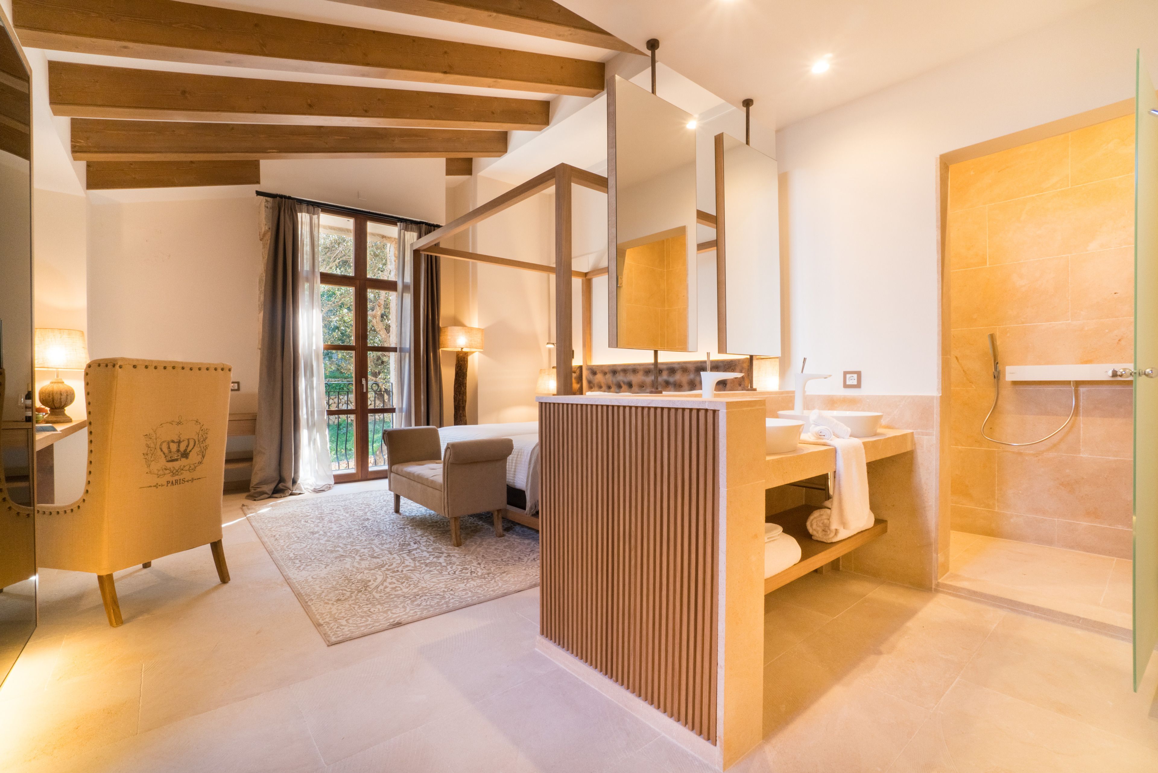 A modern bathroom with a wooden ceiling, a large mirror, a sink, and a shower.