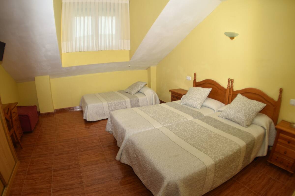 Triple Room | Desk, laptop workspace, iron/ironing board (on request), free WiFi