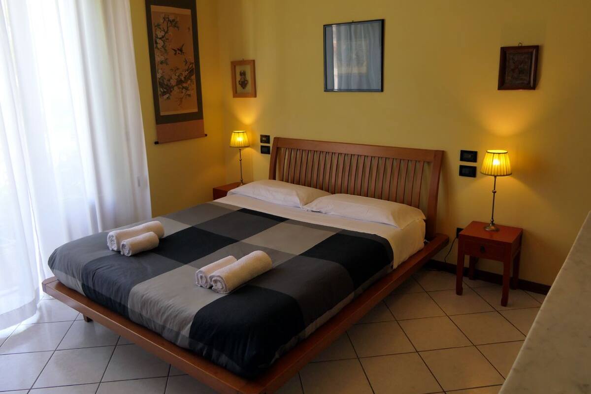 Triple Room, Private Bathroom (Gialla) | In-room safe, desk, free WiFi, bed sheets