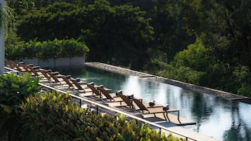 Outdoor pool, open 6 AM to 10 PM, pool umbrellas, sun loungers