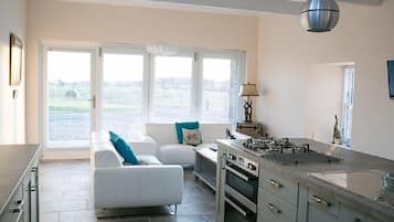 The Old Bothy, 2 Bedroom Cottage | Private kitchen | Full-size fridge, microwave, oven, stovetop