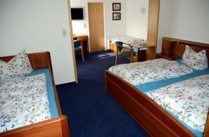 Triple Room, Balcony, Mountain View | Desk, soundproofing, iron/ironing board, free cribs/infant beds