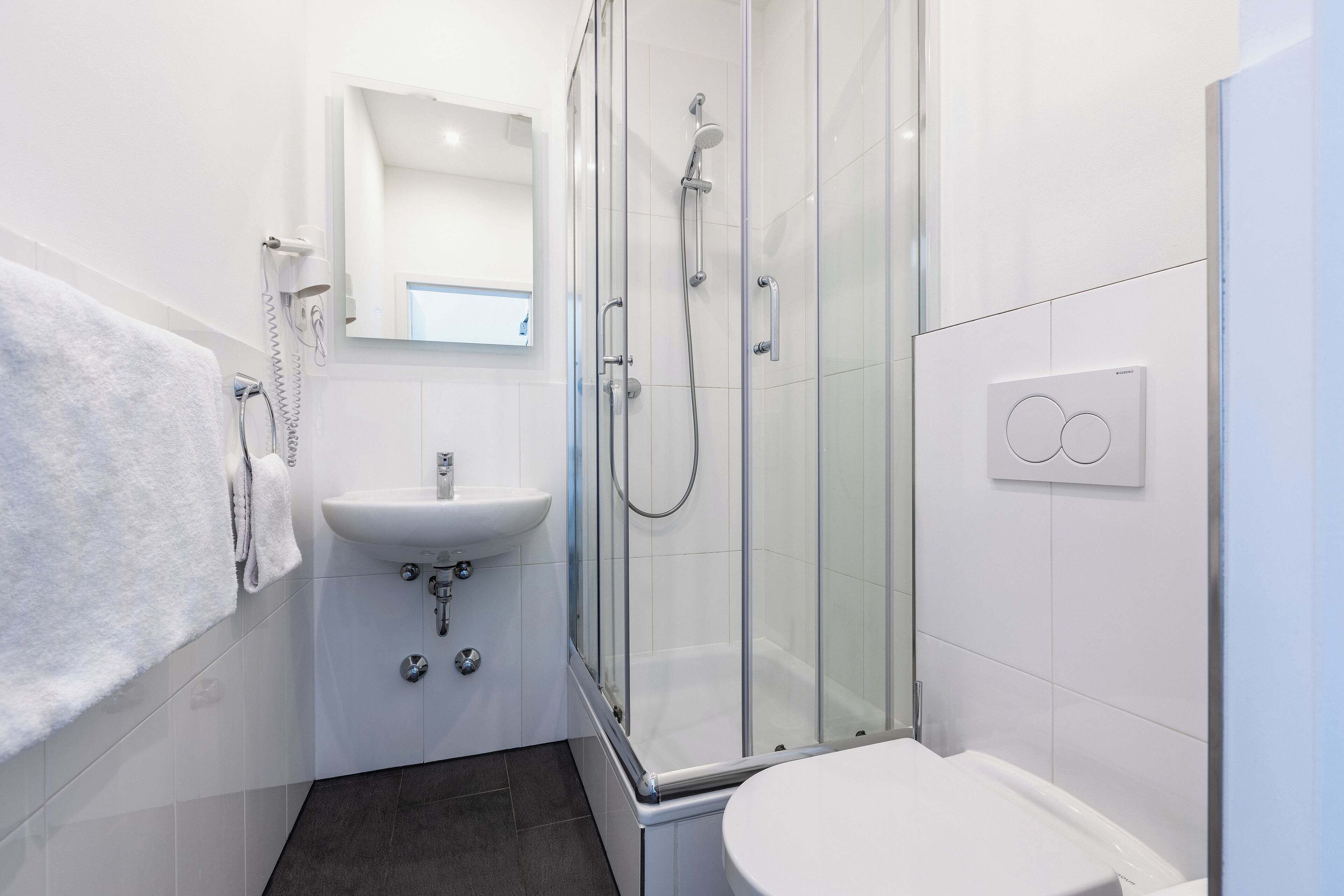 bathroom | shower, hair dryer, towels, soap