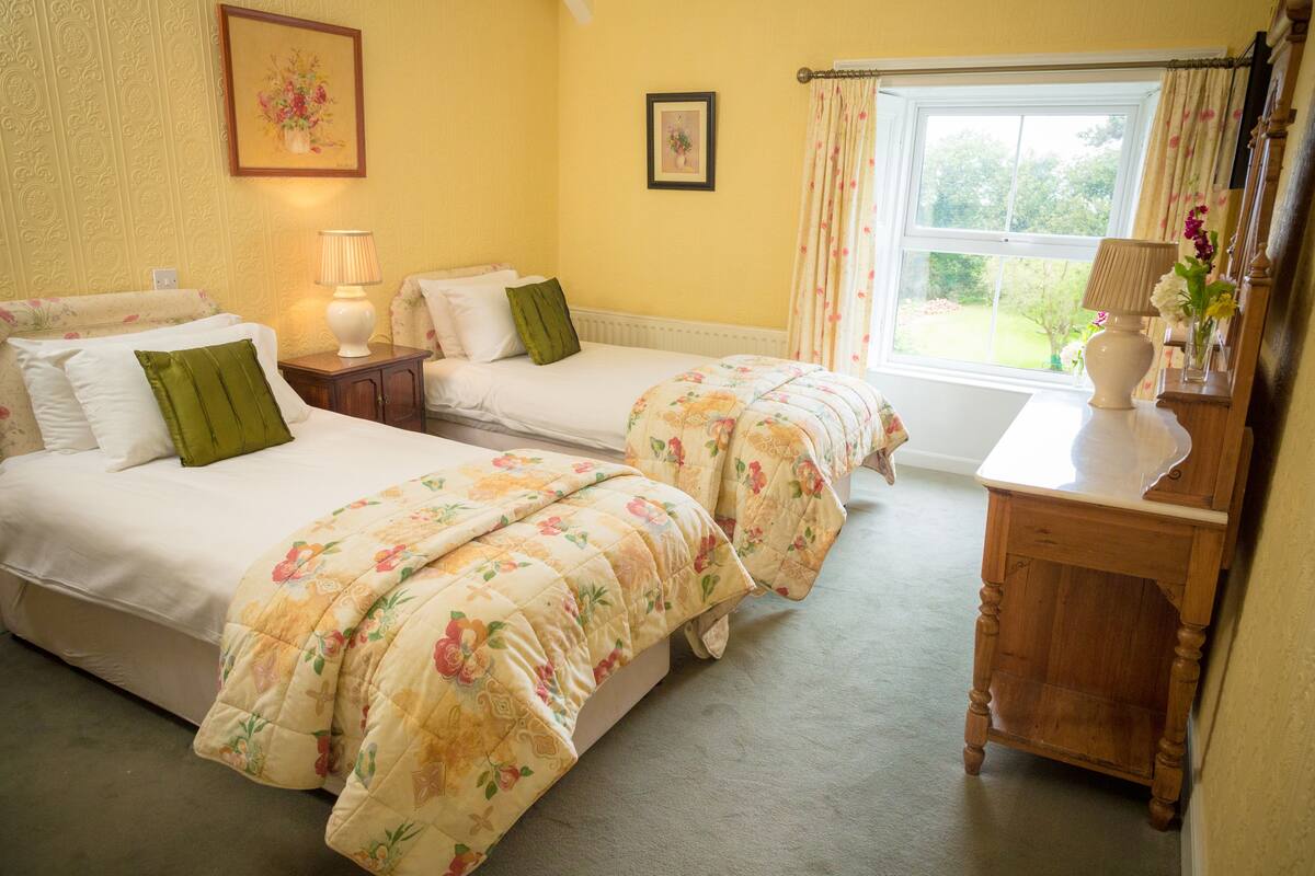 Chambre Deluxe Double ou avec lits jumeaux, vue jardin