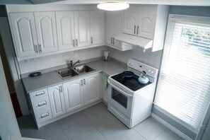 Maison, plusieurs chambres | Cuisine privée