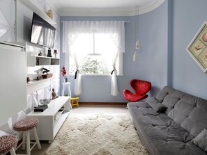 Apartamento | Área de estar | TV de tela plana