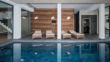 Indoor pool, open 9 AM to 8 PM, sun loungers