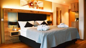 Hypo-allergenic bedding, down comforters, minibar, in-room safe