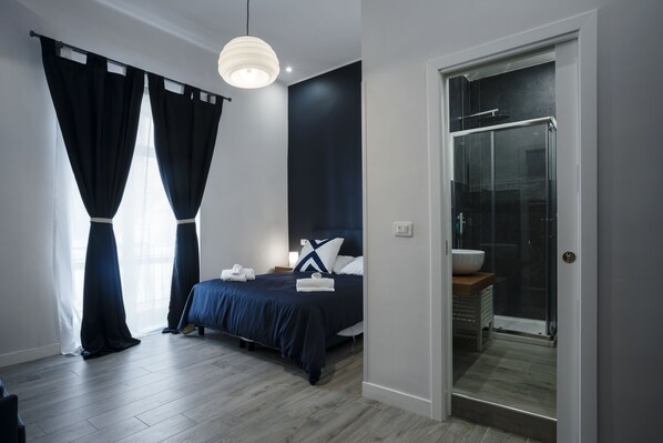 Deluxe Quadruple Room, Balcony | Down comforters, memory foam beds, individually furnished, desk - Sant'Alfonso Bed and Breakfast (Naples)