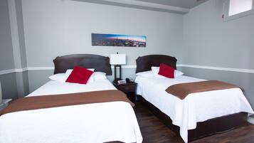 Habitación Deluxe, 2 camas matrimoniales, para no fumadores | Cortinas blackout, wifi gratis y ropa de cama