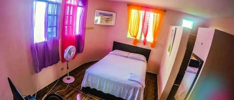 Basic Room, 1 Queen Bed, Non Smoking | Cots/infant beds, free WiFi