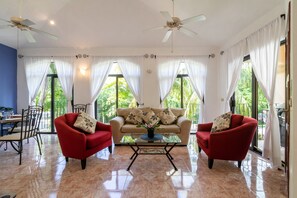 Family Condo, Multiple Beds, Non Smoking | Living area | Flat-screen TV, DVD player