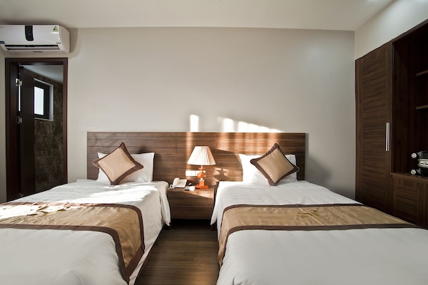 Deluxe Double or Twin Room | Minibar, in-room safe, desk, soundproofing