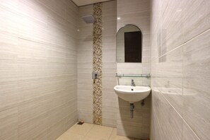 Ducha, bidet, toallas