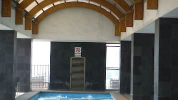 Seasonal outdoor pool, open 9 AM to 10 PM, pool loungers