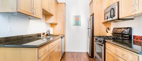 Luxury Apartment, 2 Bedrooms | Private kitchen | Full-size fridge, microwave, oven, stovetop