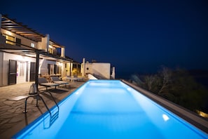 Seasonal outdoor pool, open 9:00 AM to 11:00 AM, pool umbrellas