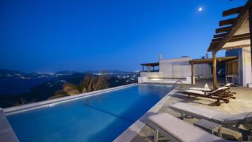 Seasonal outdoor pool, open 9:00 AM to 11:00 AM, pool umbrellas