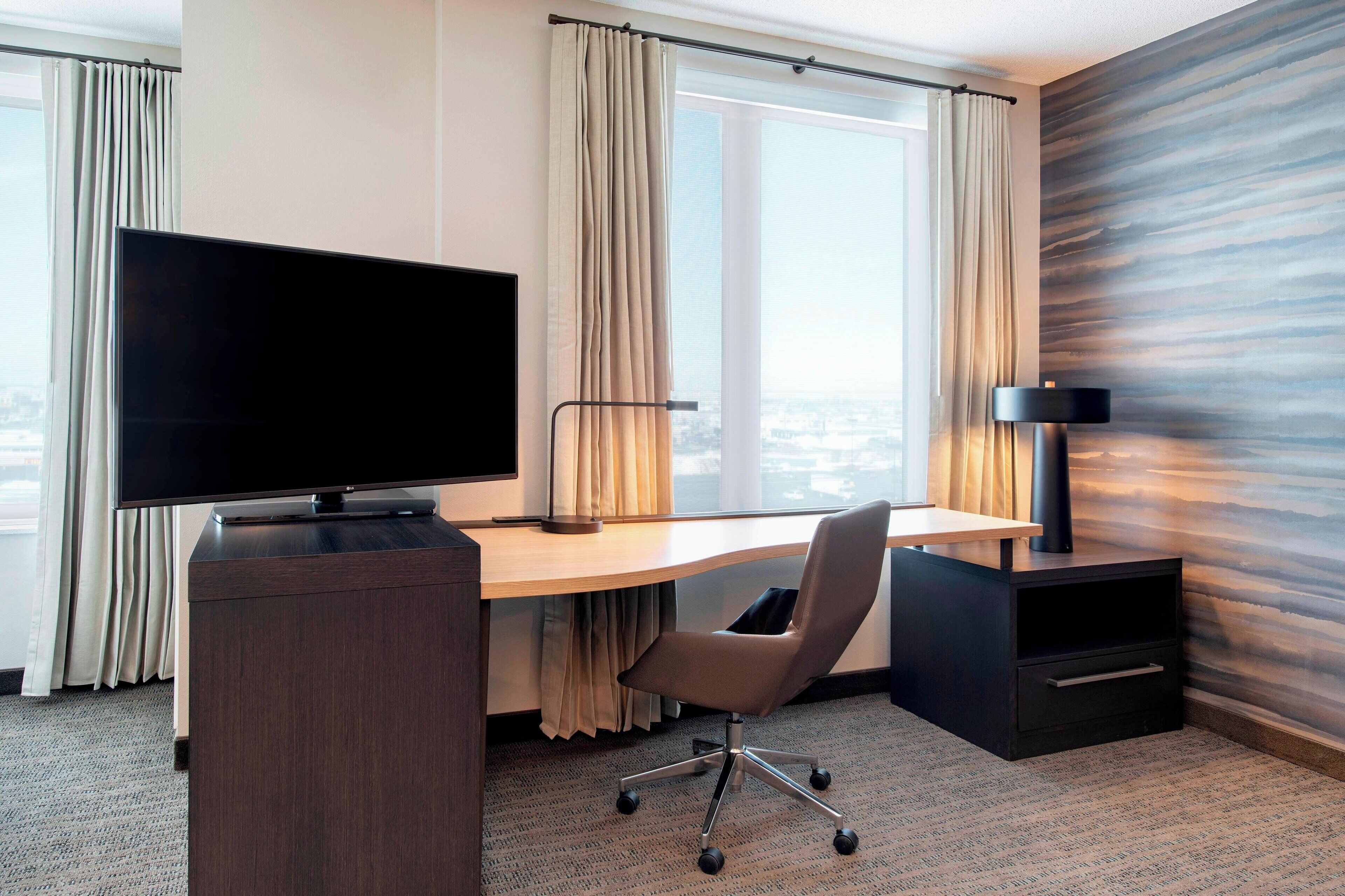 individually decorated, individually furnished, desk, blackout curtains