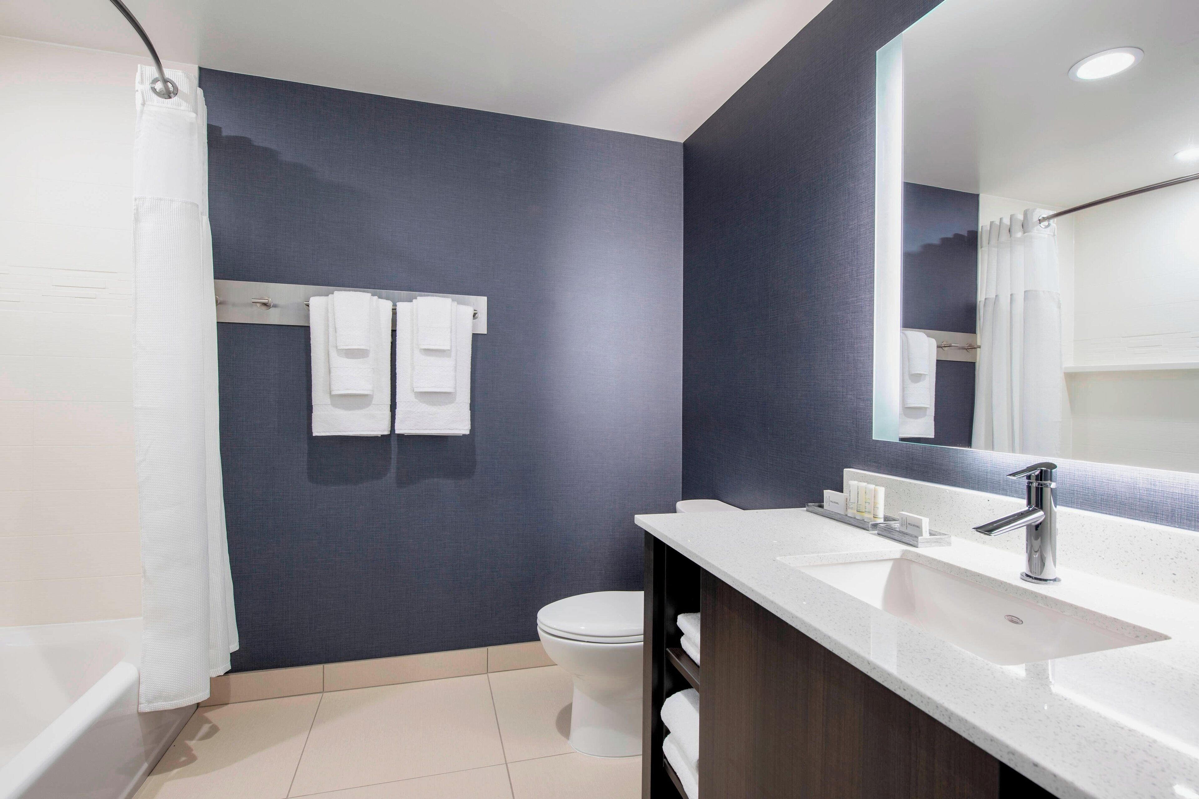 rainfall showerhead, free toiletries, hair dryer, towels