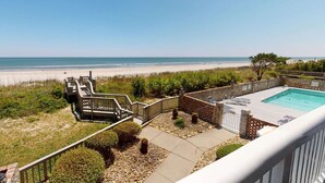 A pool area with a view of the beach. - *Fall into Savings-20% Off New Bookings thru 2026* (Surfside Beach)