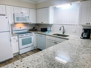 Fridge, microwave, dishwasher, coffee/tea maker
