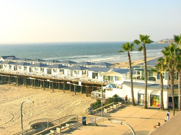 On the beach, sun-loungers