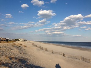On the beach, sun-loungers