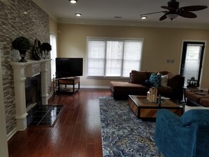 Smart TV, fireplace, DVD player, books