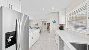 Fridge, microwave, oven, stovetop - Casa Clara - 2 Bedroom, 2 Bath Vacation Home with Electric Heated Pool on Gulf Access Canal (Cape Coral)