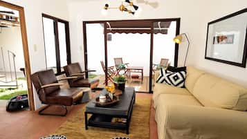 Room, Multiple Beds, Non Smoking | Living area | LED TV