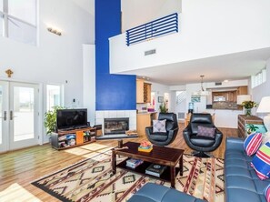 Smart TV, fireplace, DVD player, books