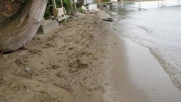 On the beach, sun loungers