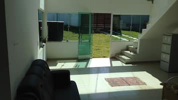 House, Non Smoking | Living area | Flat-screen TV