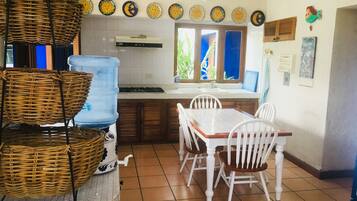 Room, Multiple Beds, Non Smoking | Private kitchen | Fridge, microwave, oven, stovetop