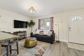 Flat-screen TV, books - 2 Pools! Have The Best Vacation! A Stylish Beach Retreat (Biloxi)